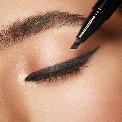 "Close-up of KIKO Milano Eyeliner Pen Creating a Dramatic Wing on Eyelid"