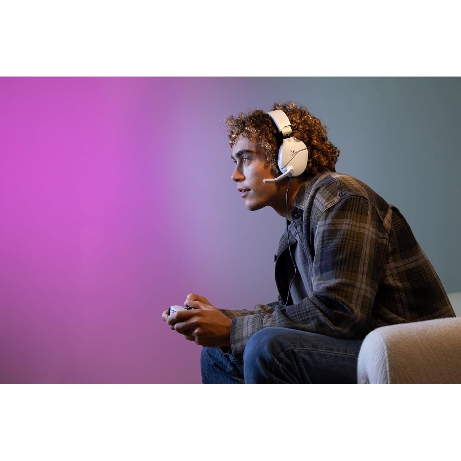 User wearing Turtle Beach Recon 70 White Gaming Headset demonstrating the comfortable fit and lightweight design